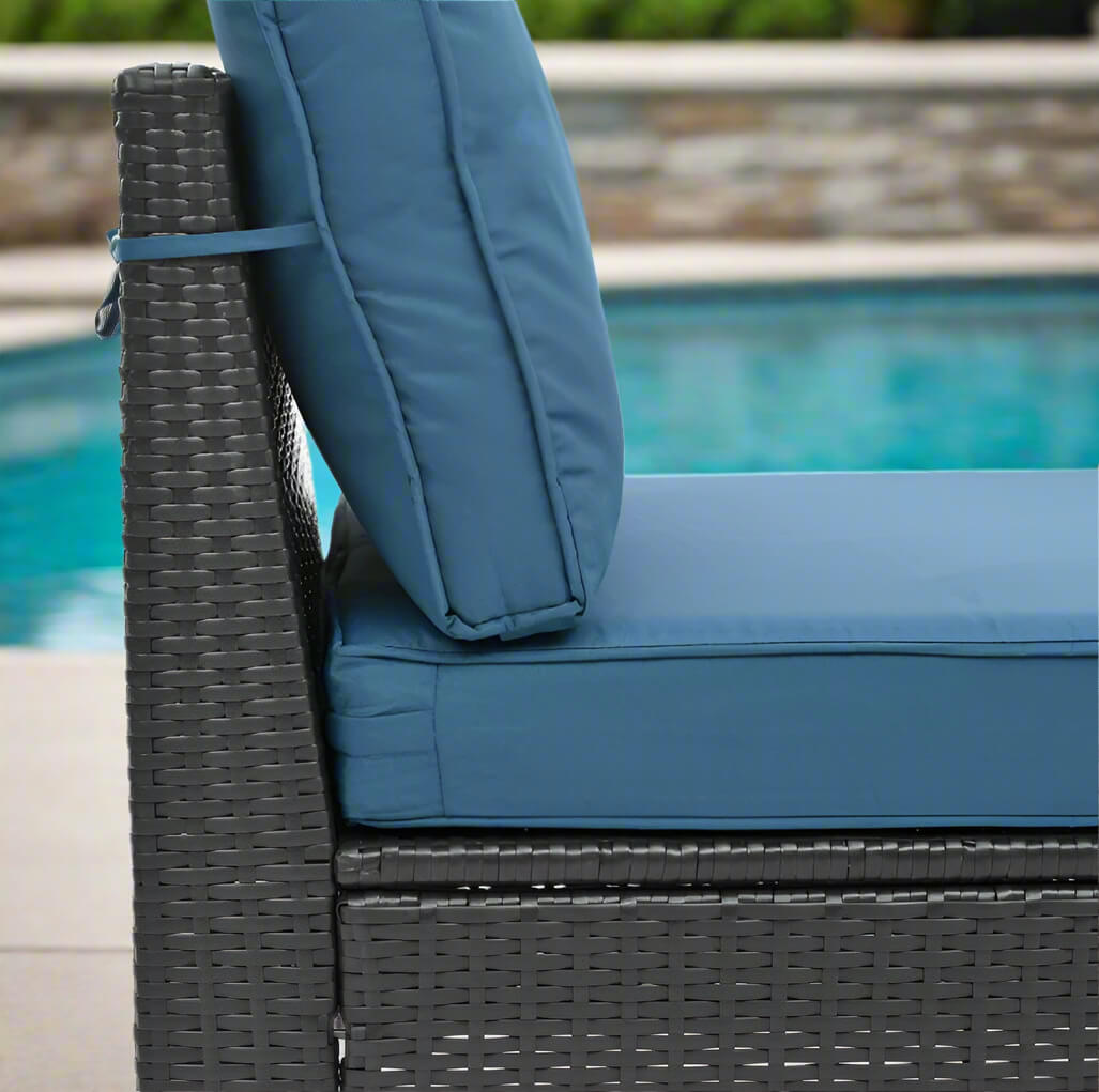 A sofa from the 10 pieces of the Wicker Sectional Patio Set sold by WorkZen Interiors