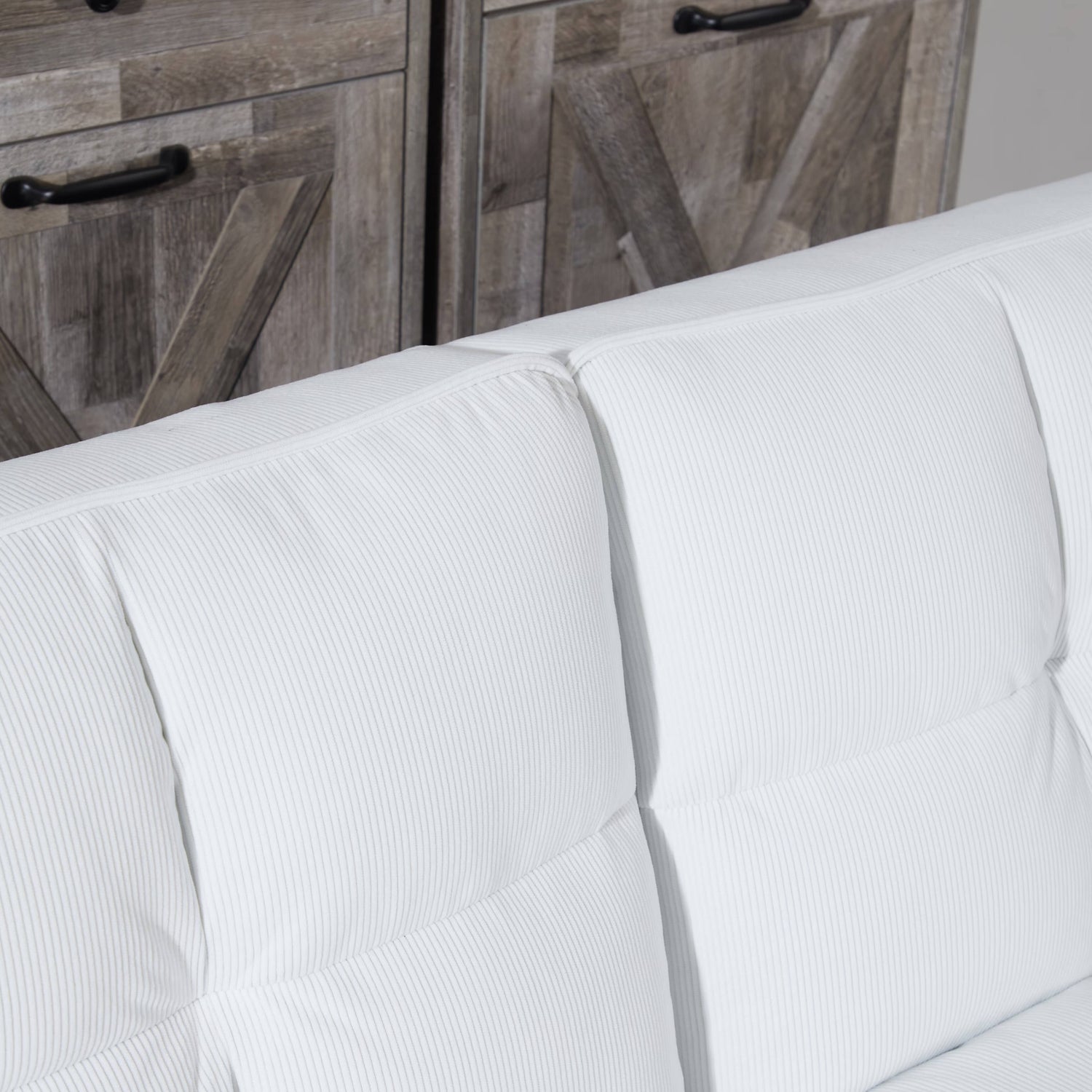 The backrest of a Boston White Chair Sofa Bed sold by WorkZen Interiors