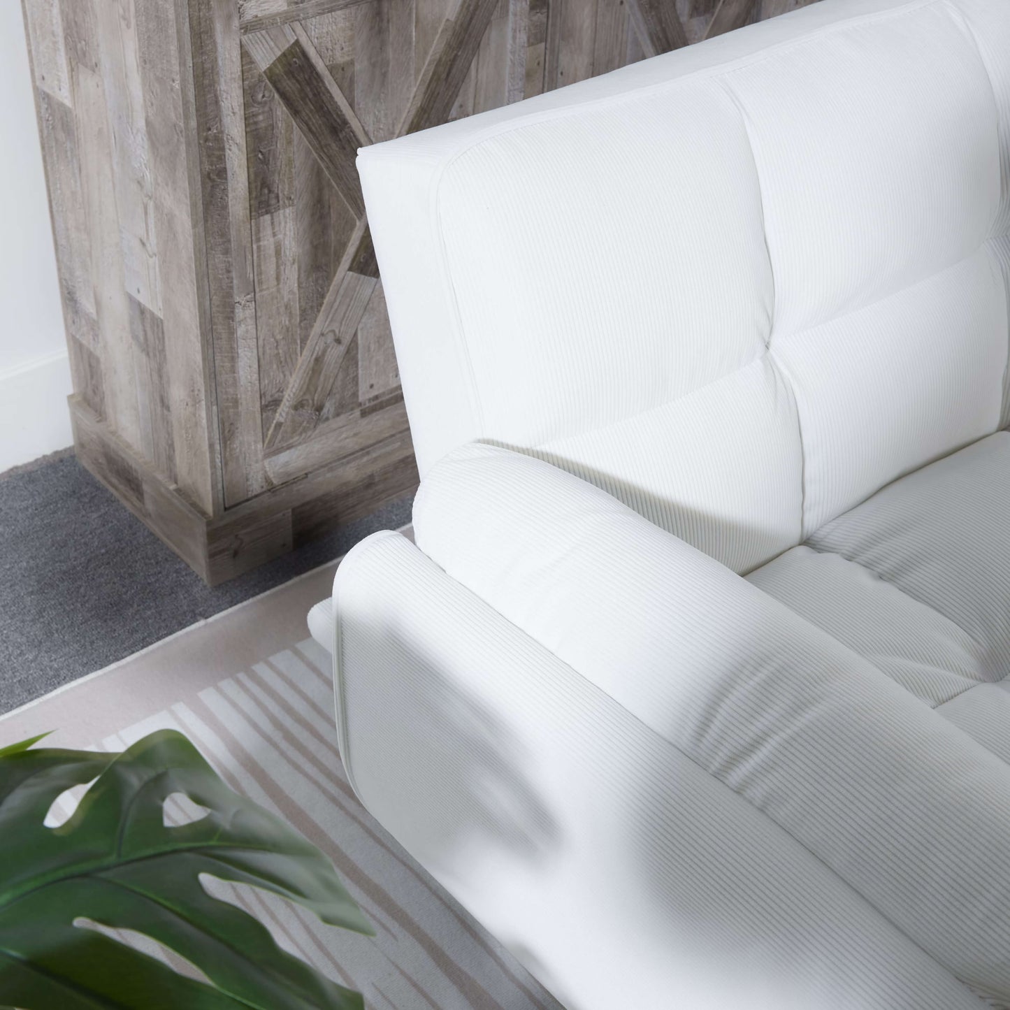 Amrest of a Boston White Chair Sofa Bed sold by WorkZen Interiors