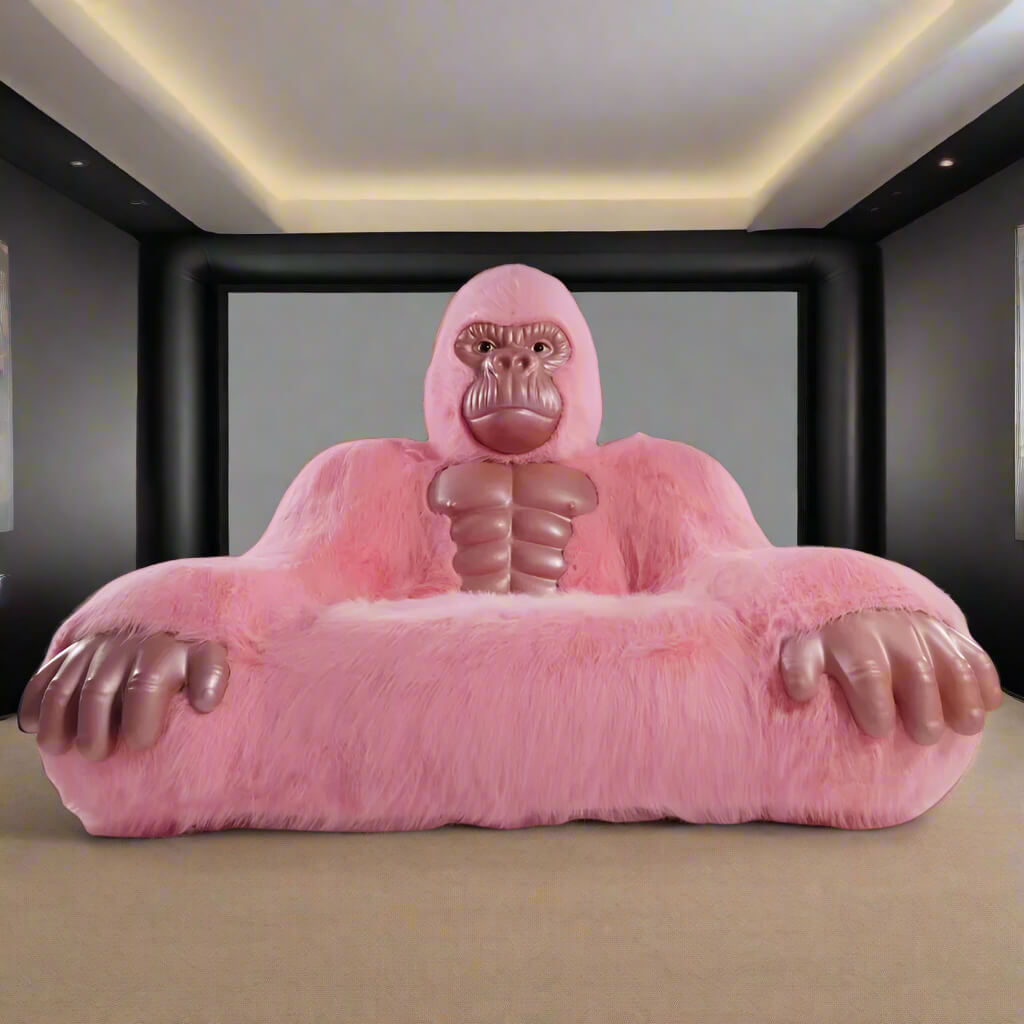 A pink inflatable gorilla sofa sold by WorkZen Interiors