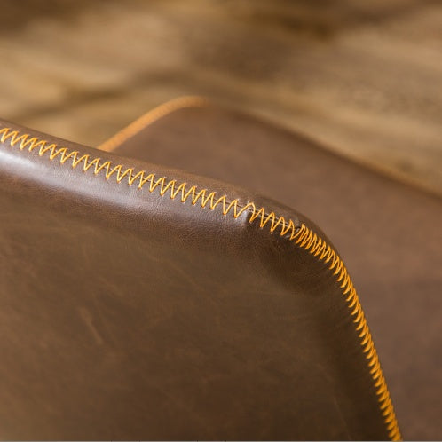 Leather and stitching of a Swiveling Office Chair sold by WorkZen Interiors