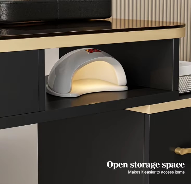 An open storage space of a black manicure table sold by WorkZen Interiors