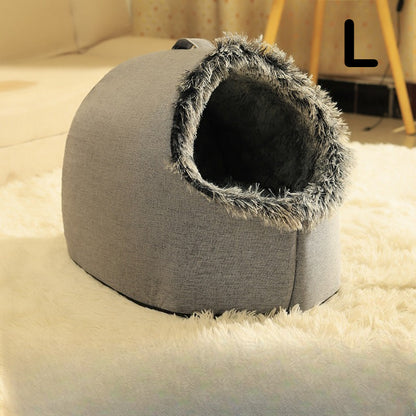 Gray cat cave bed with fluffy rim on a soft surface