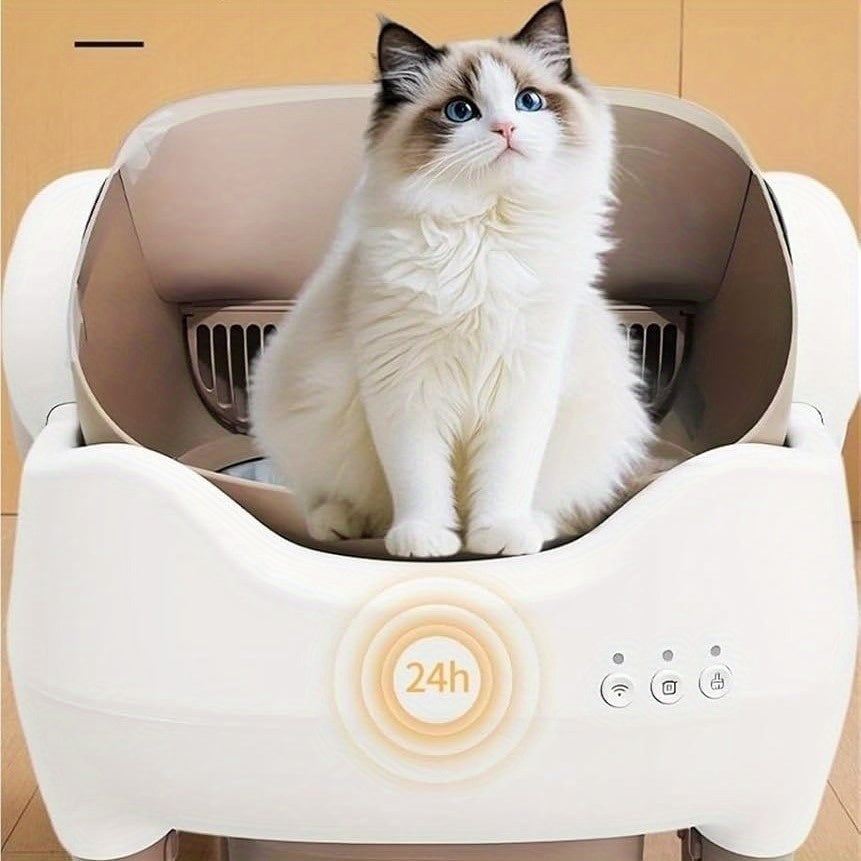 Cat sitting inside a white smart cat litter box with '24h' display on a wooden floor.