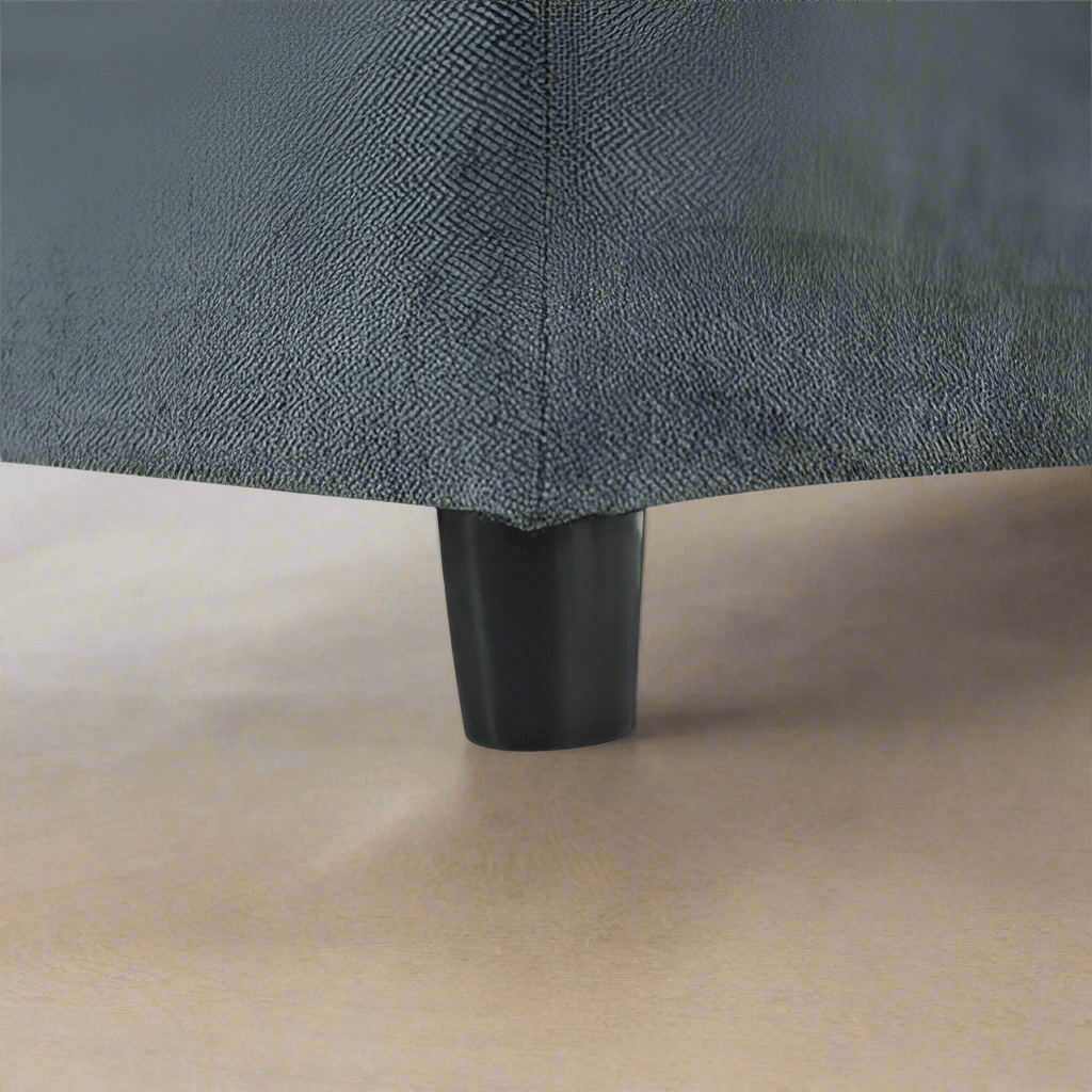 The foot of a grey 115.5 Foster Modular Deep Grey Sectional Sofa sold by WorkZen Interiors