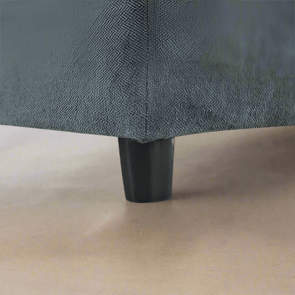 The foot of a grey 115.5 Foster Modular Deep Grey Sectional Sofa sold by WorkZen Interiors