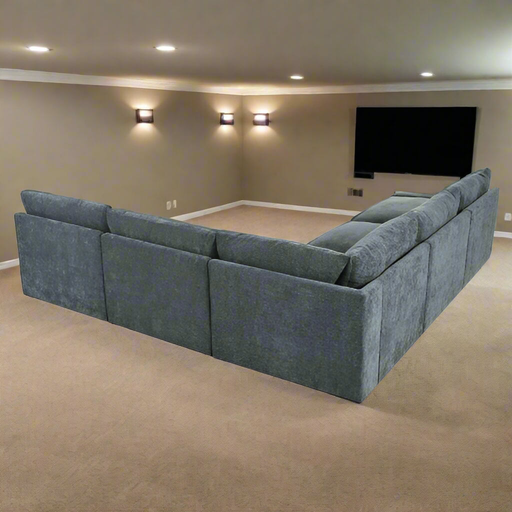 The back view of a grey 115.5 Foster Modular Deep Grey Sectional Sofa sold by WorkZen Interiors