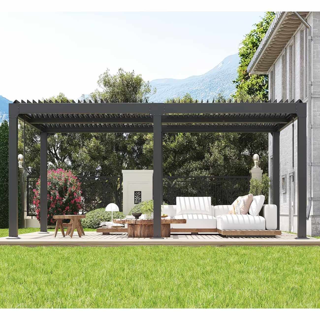 A modern pergola over a beige sectional sofa, surrounded by greenery and trees