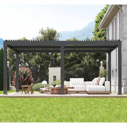 A modern pergola over a beige sectional sofa, surrounded by greenery and trees