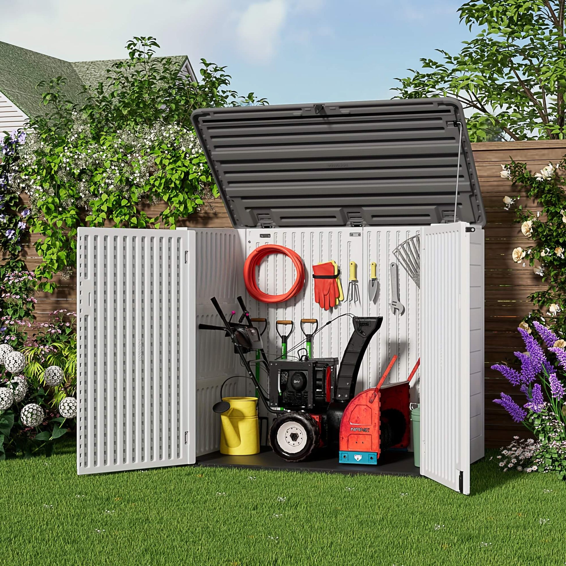 White resin outdoor storage shed with gardening tools and equipment in a garden setting.