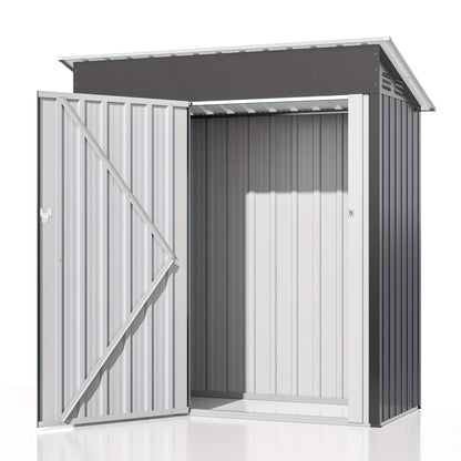 Metal storage shed with open door on a white background