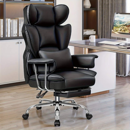 Black executive office chair in a home office setting with a desk and computer monitor.