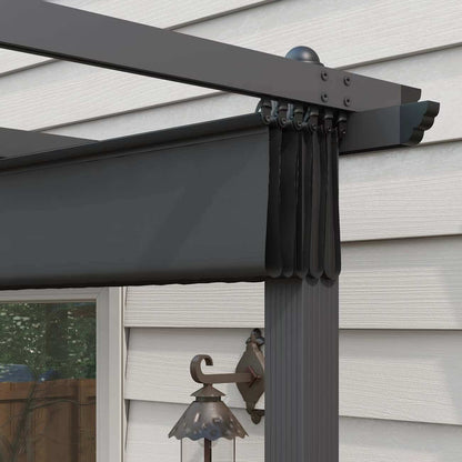Close-up of a gray patio umbrella with a house exterior in the background