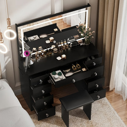 Black vanity desk with mirror and various items in a room setting