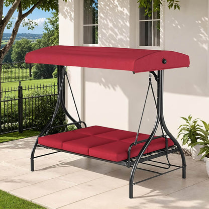 Red outdoor swing with canopy on a patio
