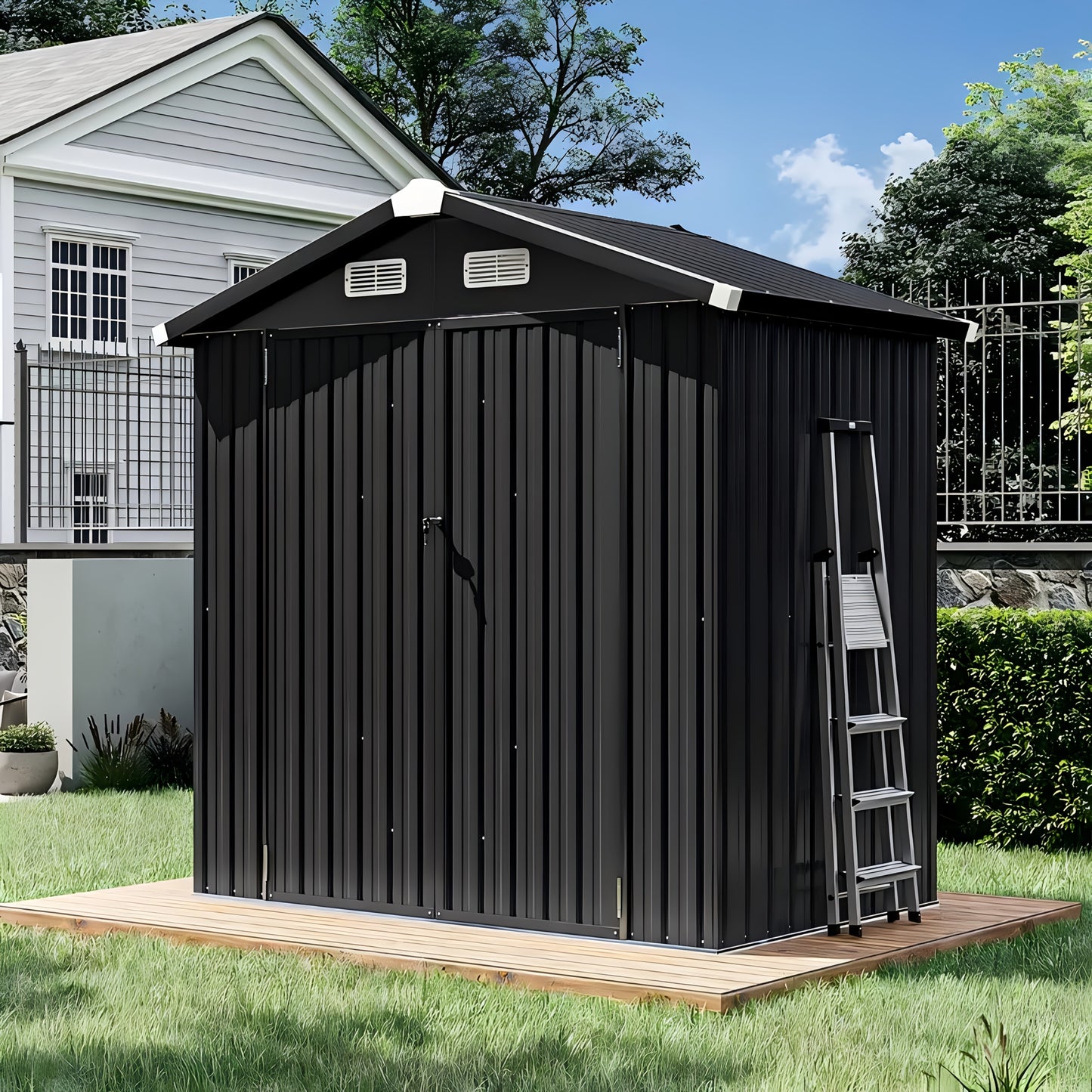 Black metal storage shed with a ladder on a grassy area in front of a house.