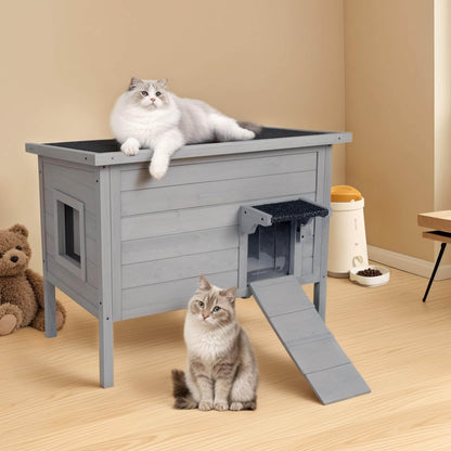 Gray cat house with two cats on a wooden floor.