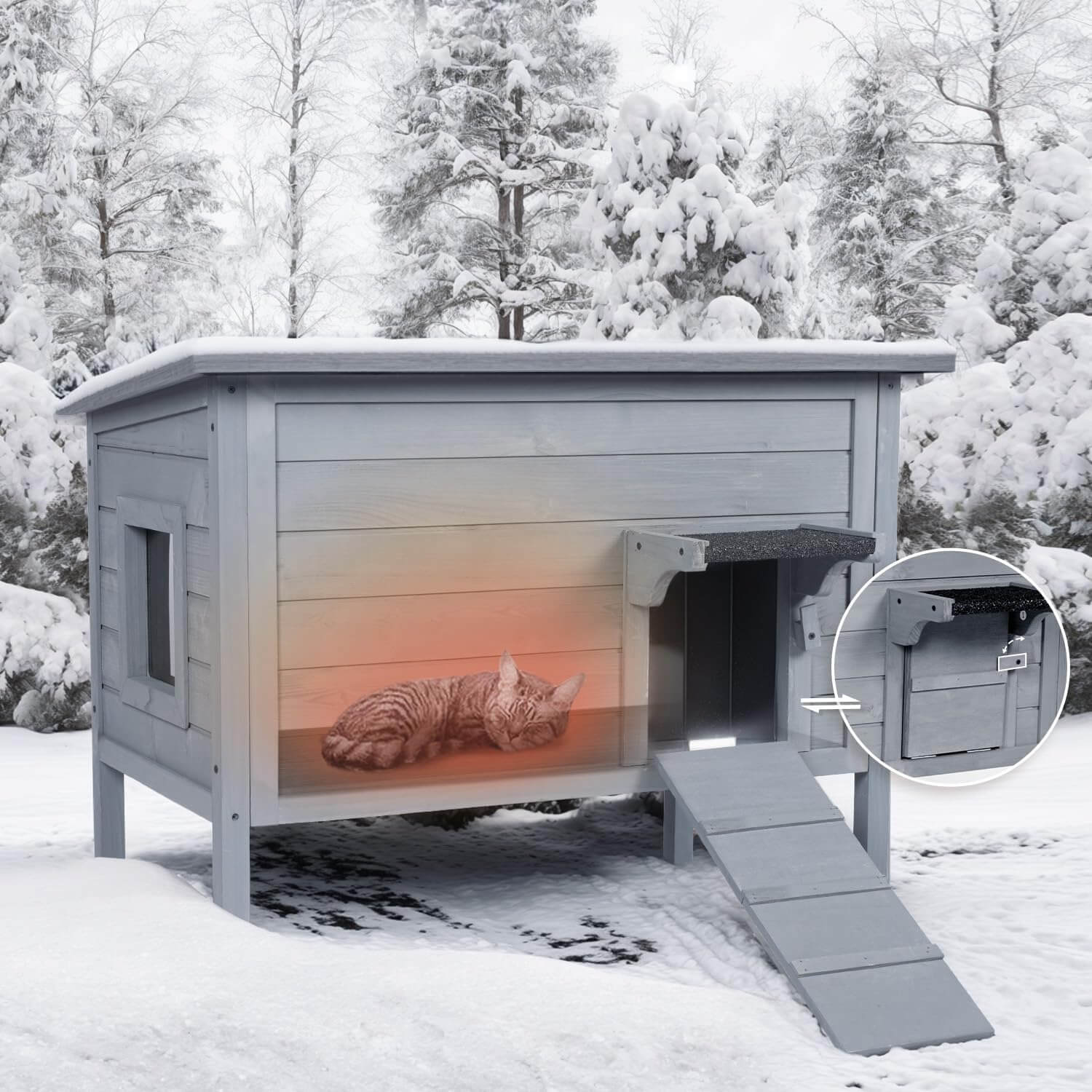 Gray outdoor cat house with a ramp in a snowy landscape, featuring a cat inside.