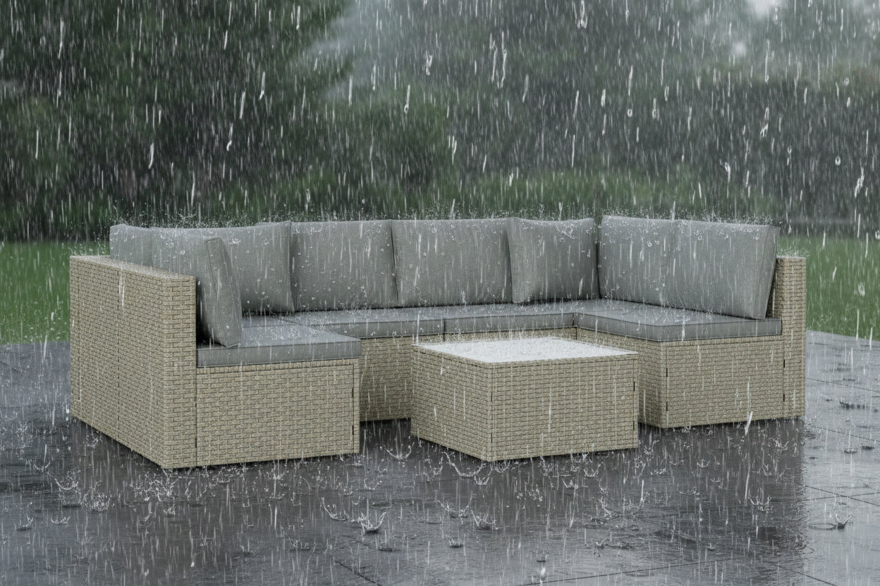 Outdoor furniture set with a sectional sofa and ottoman on a white background