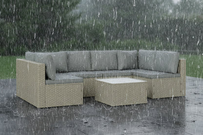 Outdoor furniture set with a sectional sofa and ottoman on a white background