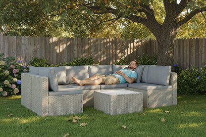 Outdoor furniture set with a sectional sofa and ottoman on a white background