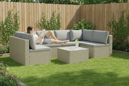 Outdoor furniture set with a sectional sofa and ottoman on a white background