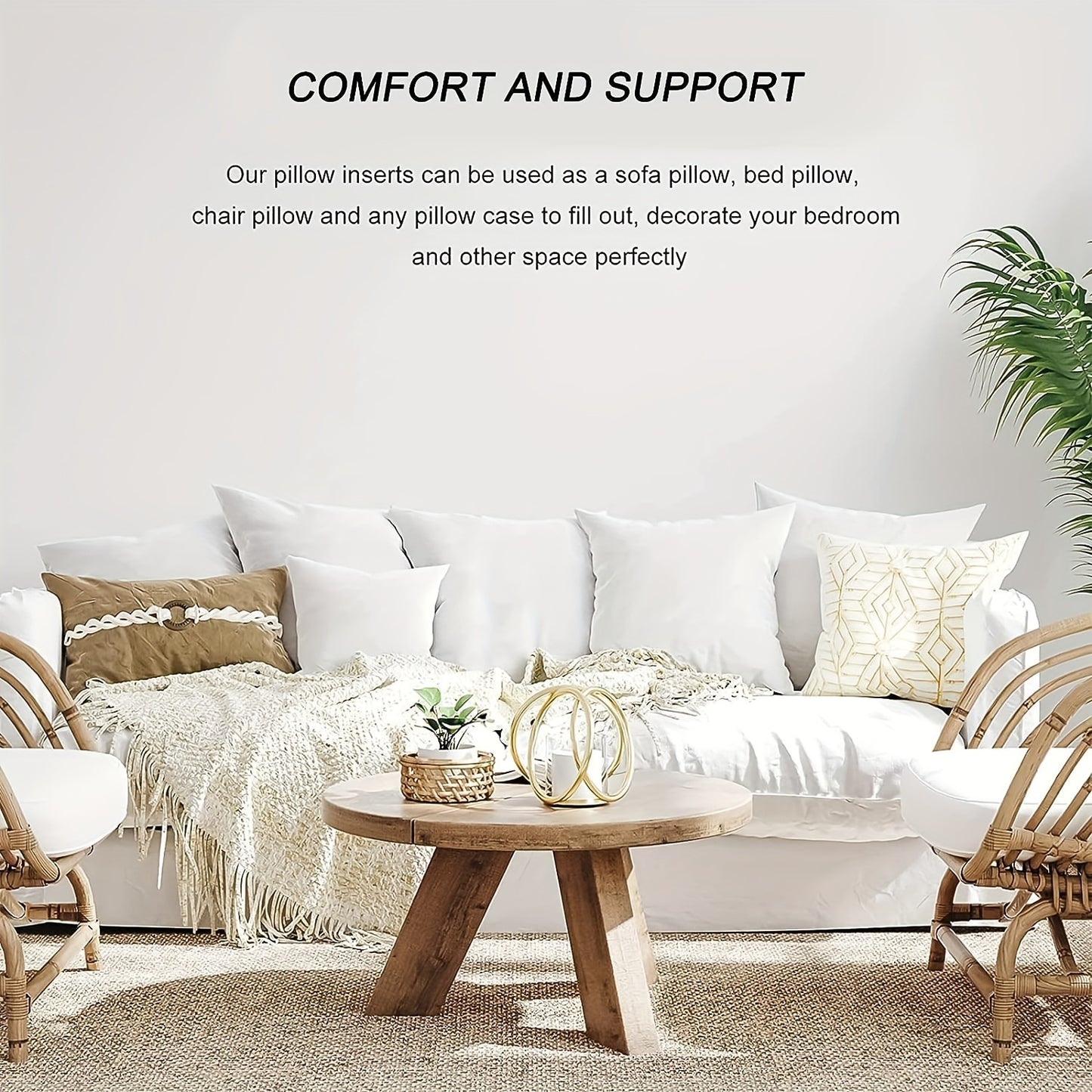 Living room with white sofa, wooden coffee table, and decorative pillows.