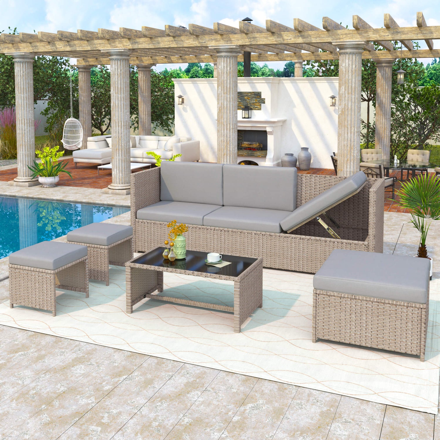 Outdoor patio furniture set with sofa, chairs, and table on a patio with pool and pergola in the background.
