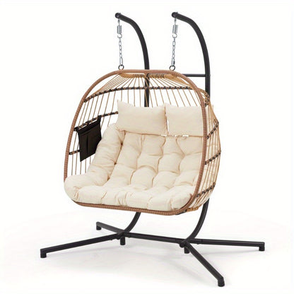 Hanging chair with beige cushions on a white background