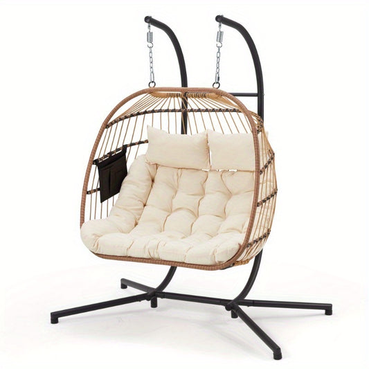Hanging chair with beige cushions on a white background