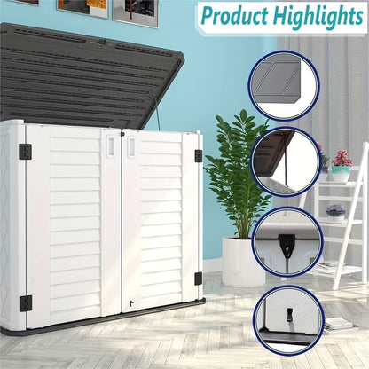 White resin outdoor storage shed with black lid in a room with a plant and furniture.