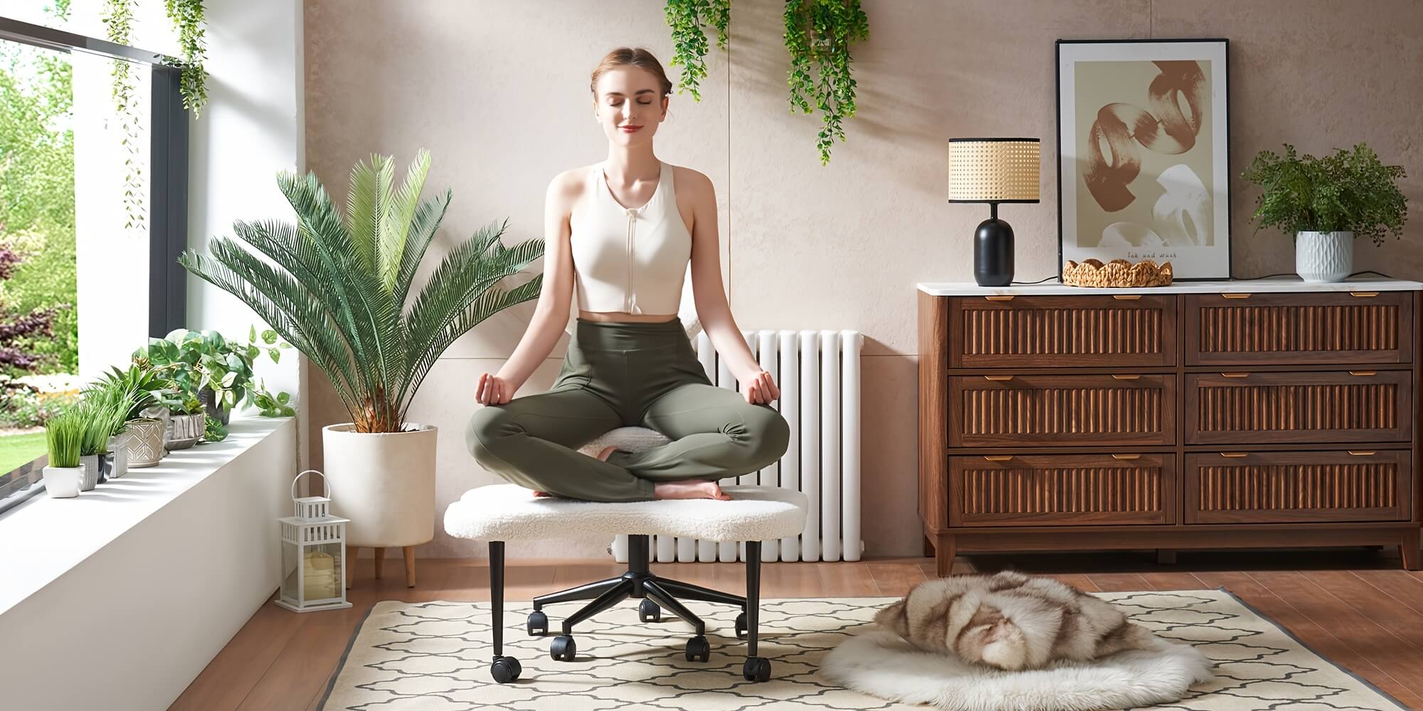Woman meditating on a chair in a modern living room with plants and furniture.