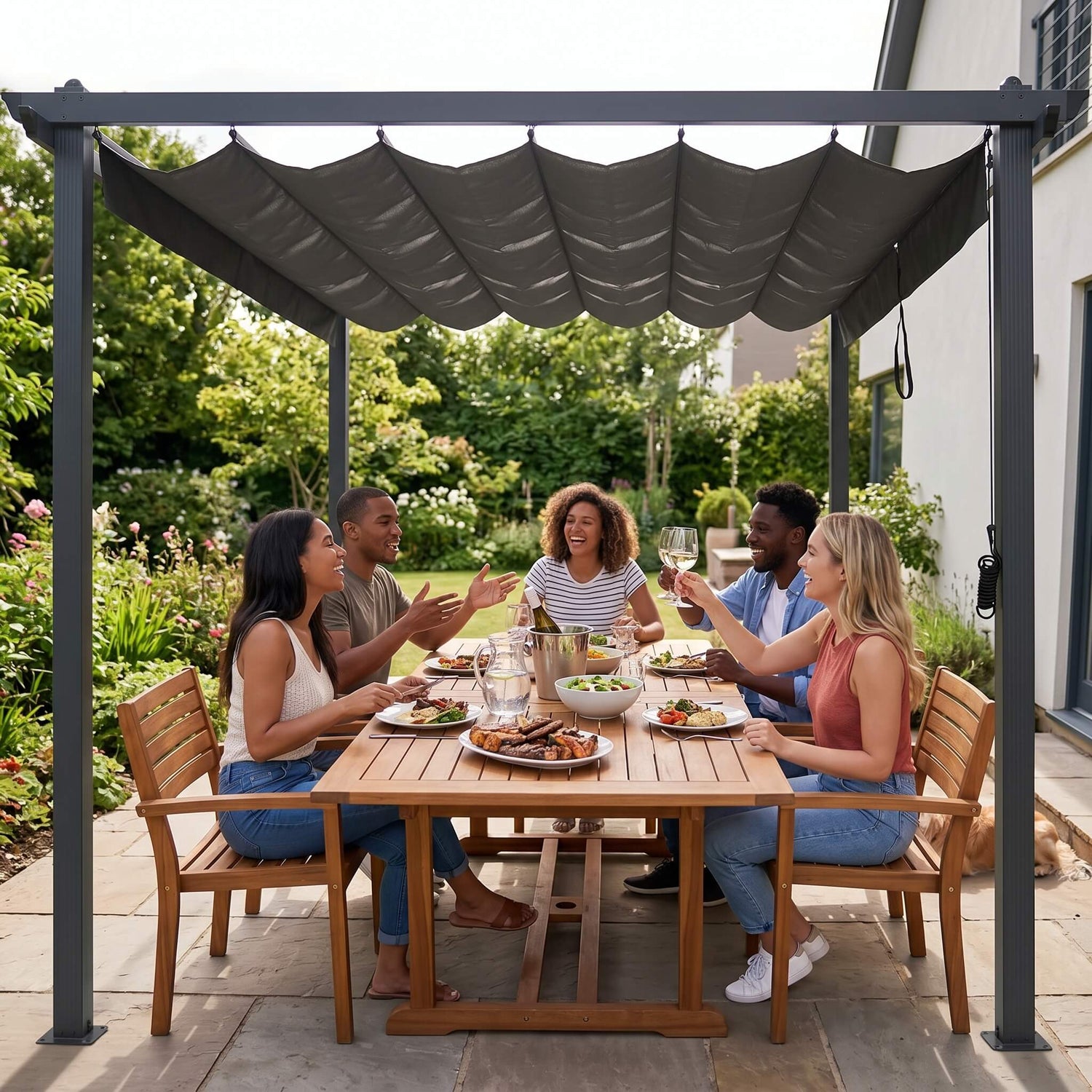 Group of people dining outdoors under a pergola