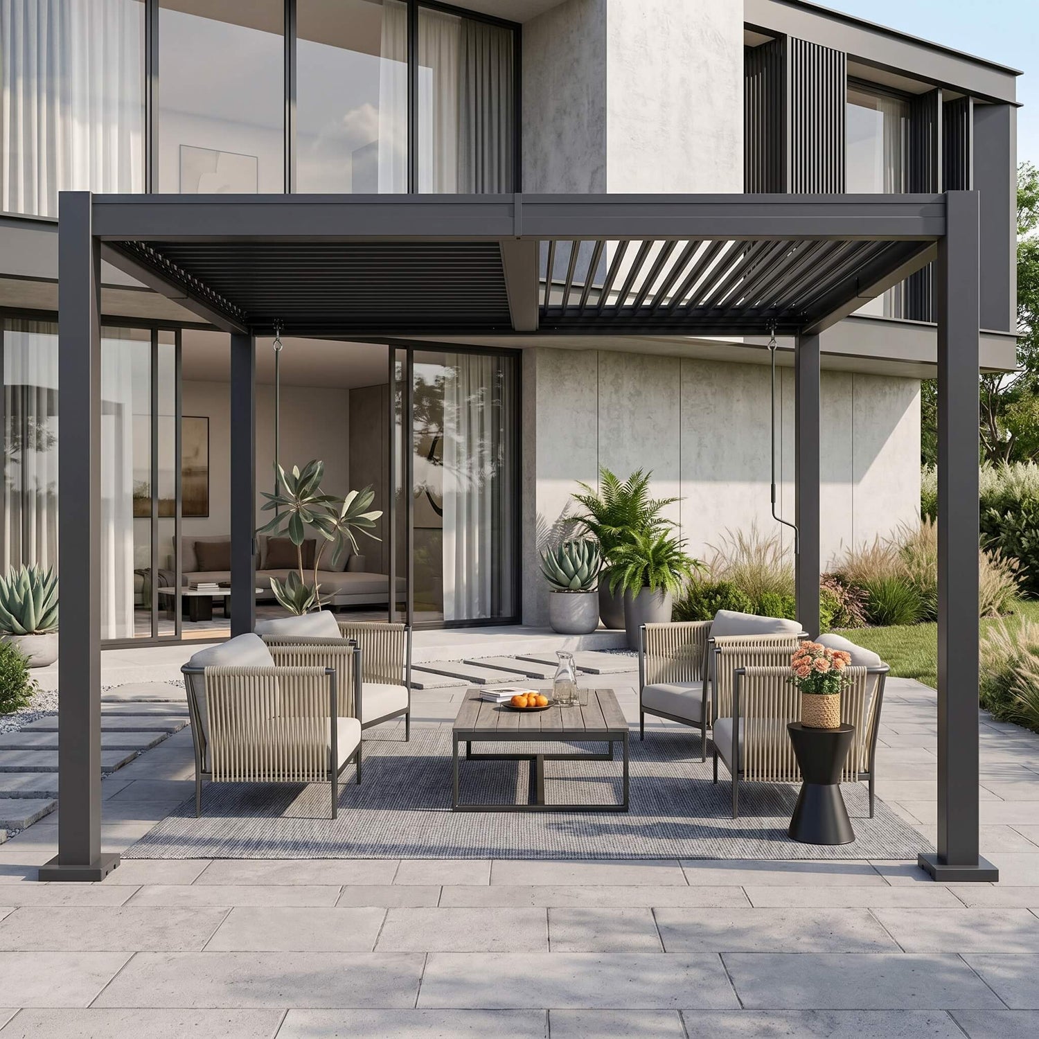 Outdoor patio area with pergola, furniture, and plants in front of a modern house.
