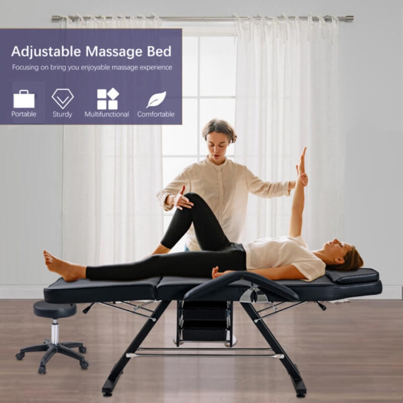 A masseurs working with a female client who is lying down on a aromatherapy massage bed sold by WorkZen Interiors