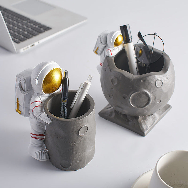 2 Astronaut Desk Pen Holders sold by WorkZen Interiors