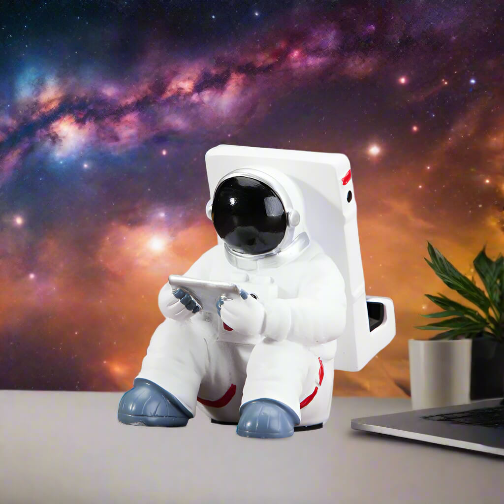 A white astronaut desk phone holder sold by WorkZen Interiors