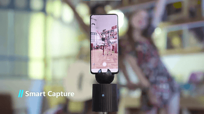 A black auto object tracking phone holder sold by WorkZen Interiors