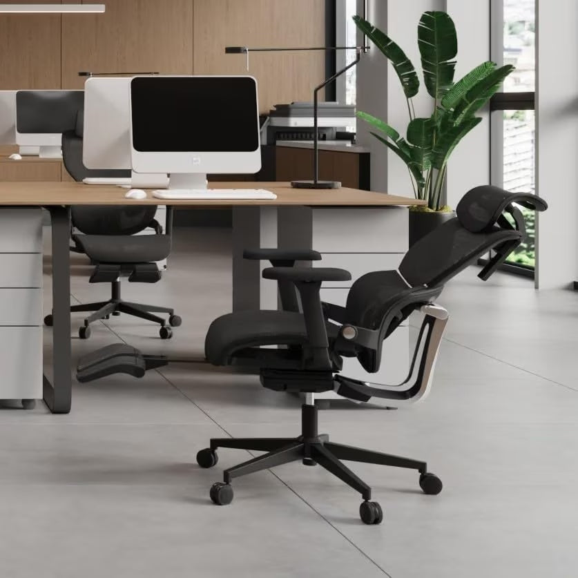A black big and tall mesh office chair in an office sold by WorkZen Interiors