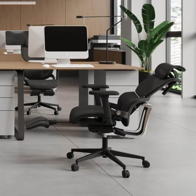 A black big and tall mesh office chair in an office sold by WorkZen Interiors