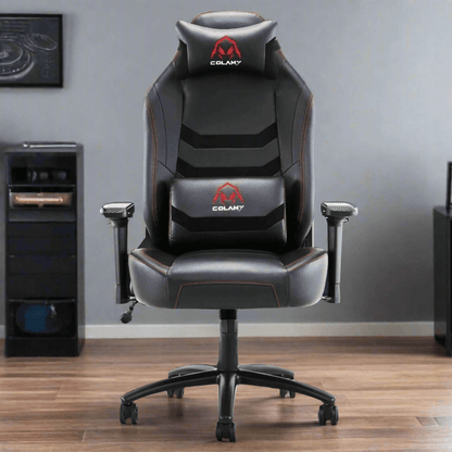 A black heavy duty gaming chair​ in a gaming room surrounded by a gaming station
