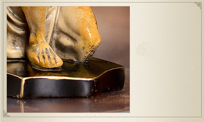A Charon Resin Sculpture Of Office Figures sold by WorkZen Interiors