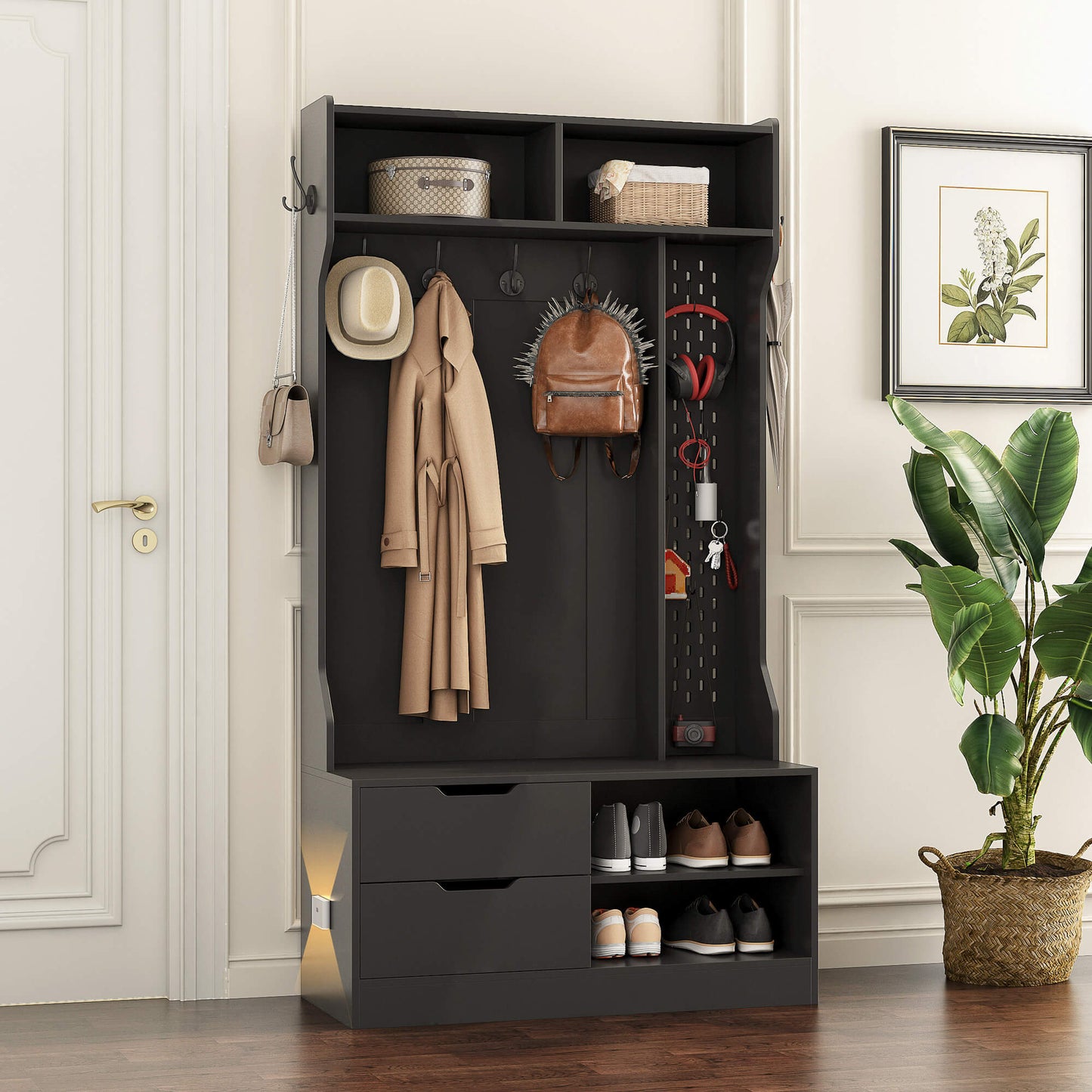 A black coat rack with shoe storage sold by WorkZen Interiors