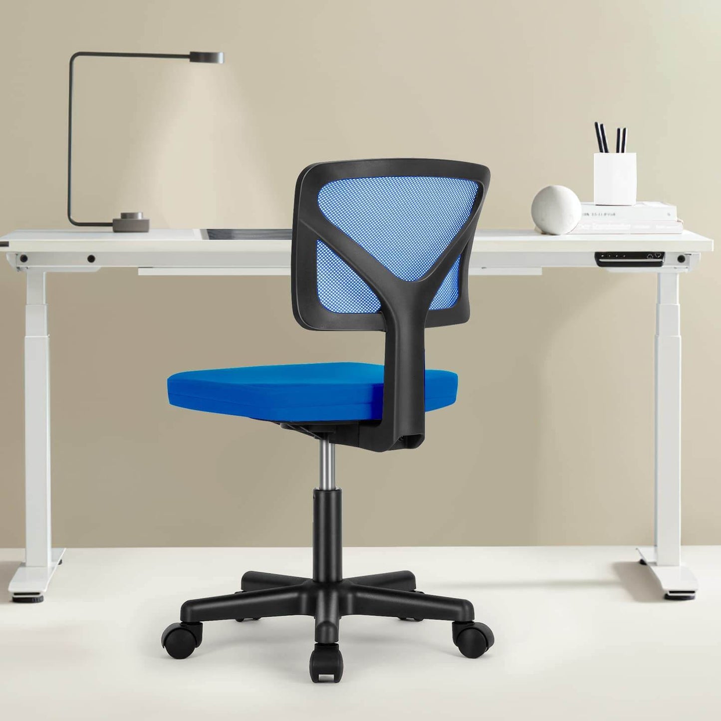 A blue Ergo Mesh Office Chair sold by WorkZen Interiors