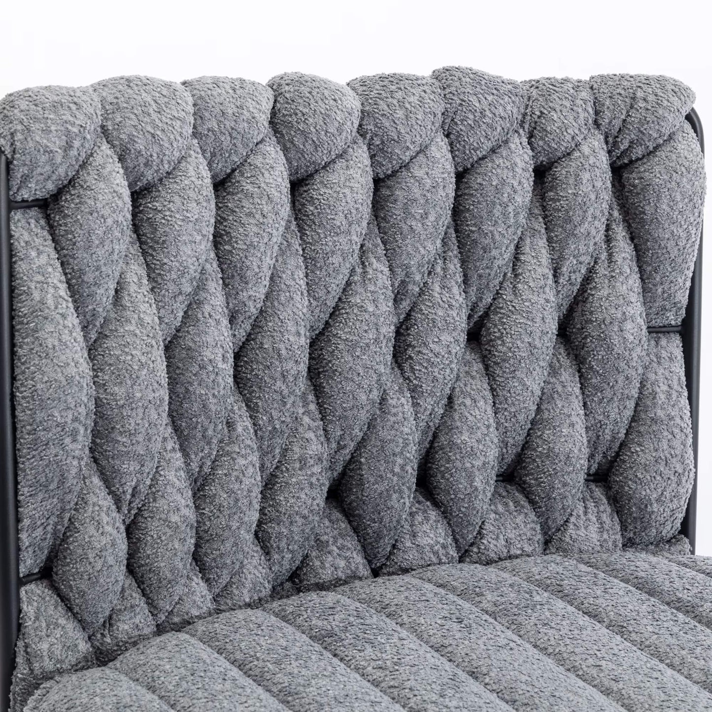 The backrest of a Gray fabric office chair sold by WorkZen Interiors