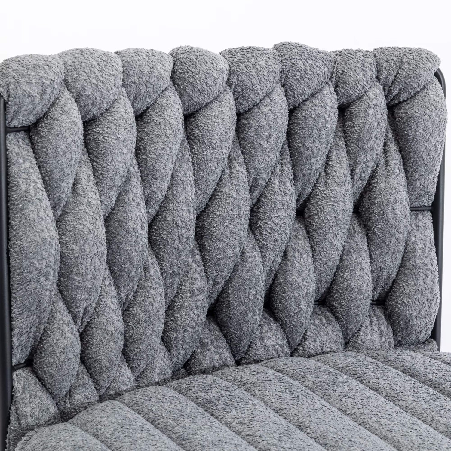 The backrest of a Gray fabric office chair sold by WorkZen Interiors
