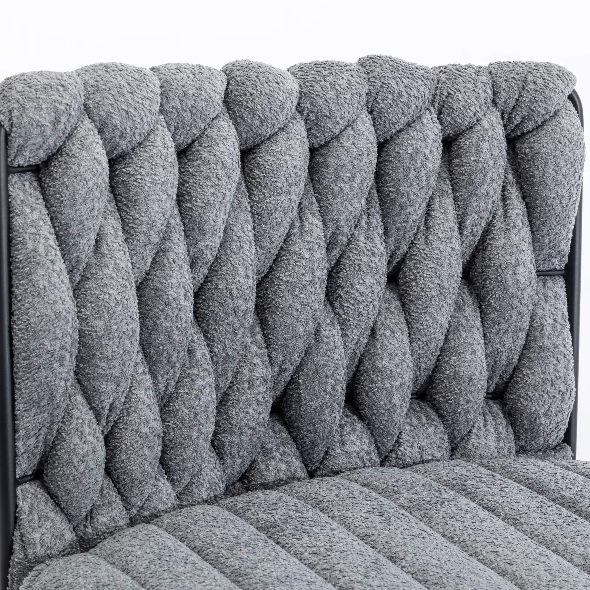 The backrest of a Gray fabric office chair sold by WorkZen Interiors