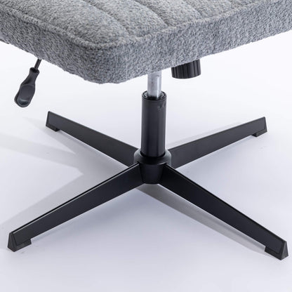 The height adjustment levers of a Gray fabric office chair sold by WorkZen Interiors