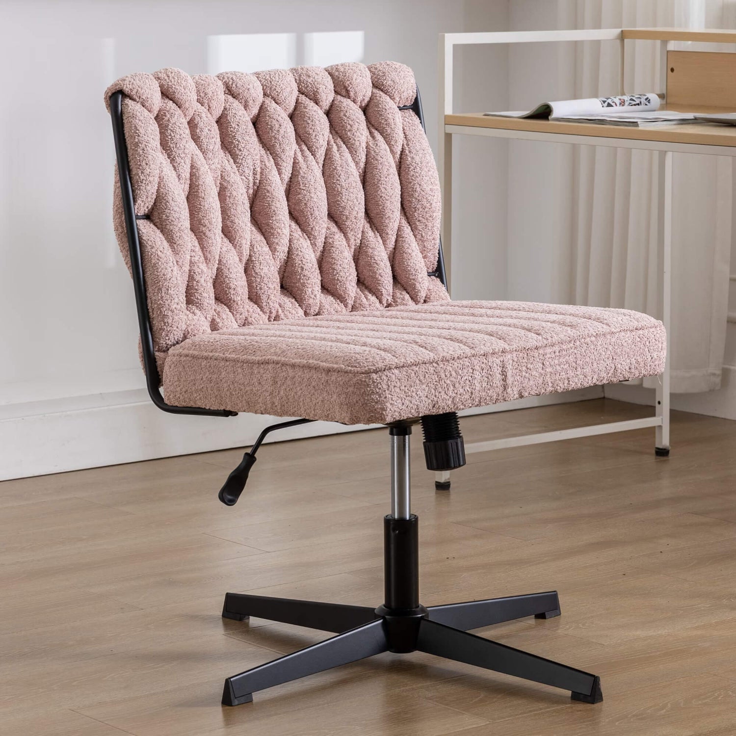 A pink fabric office chair sold by WorkZen Interiors