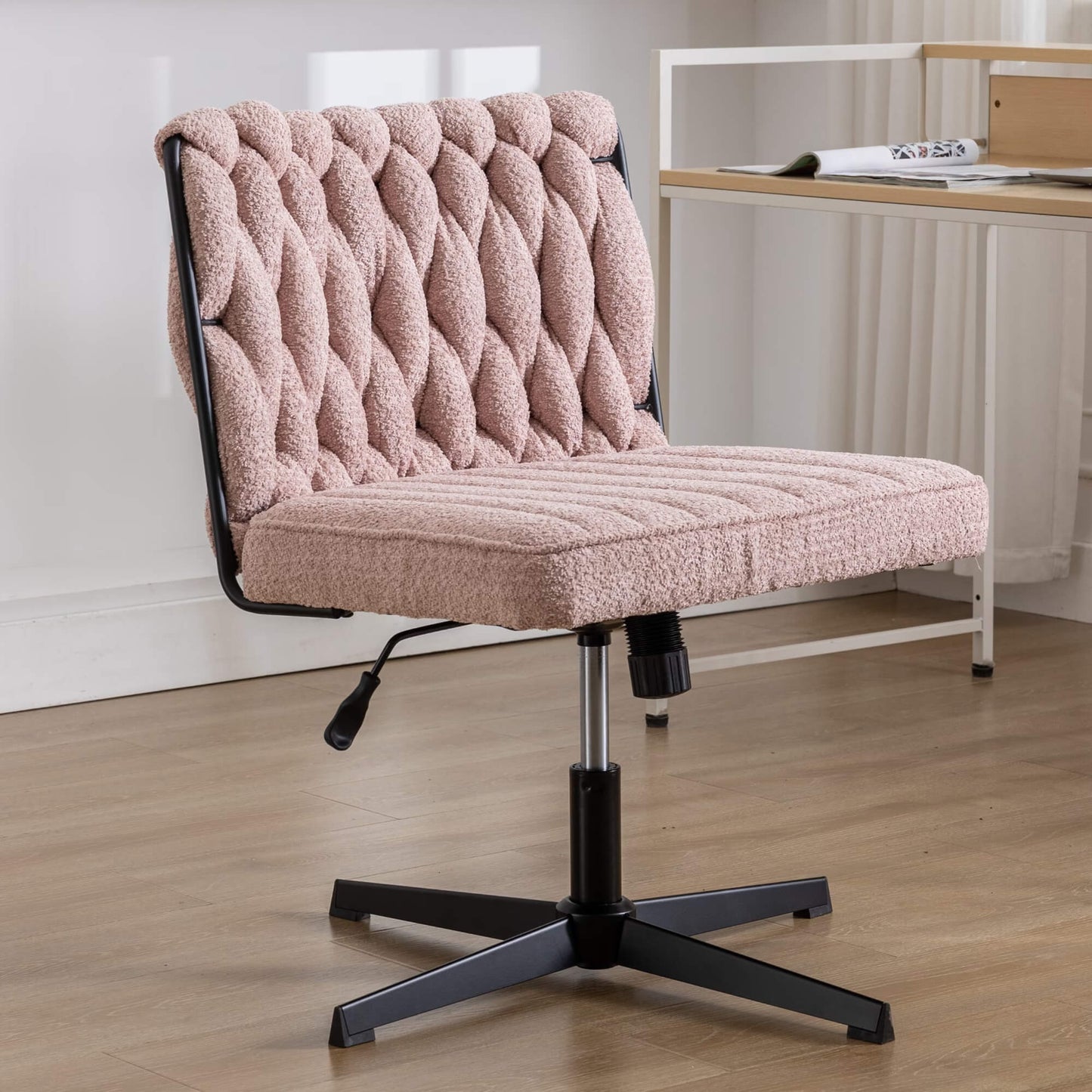 A pink fabric office chair sold by WorkZen Interiors